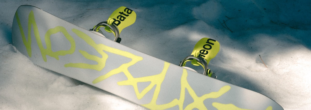 Bataleon mens snowboard bindings being used while riding a rail.