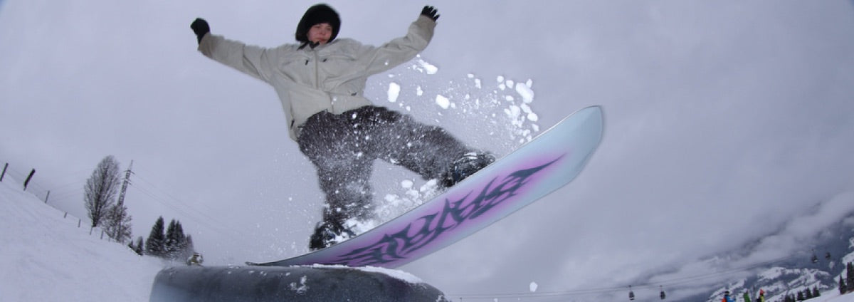 Women's snowboard boots being displayed